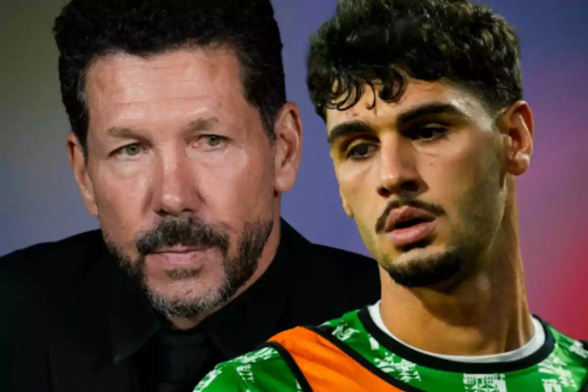 Dos hombres aparecen en primer plano, uno con barba y cabello oscuro vestido de negro y el otro con camiseta deportiva verde y chaleco naranja, ambos con expresiones serias.