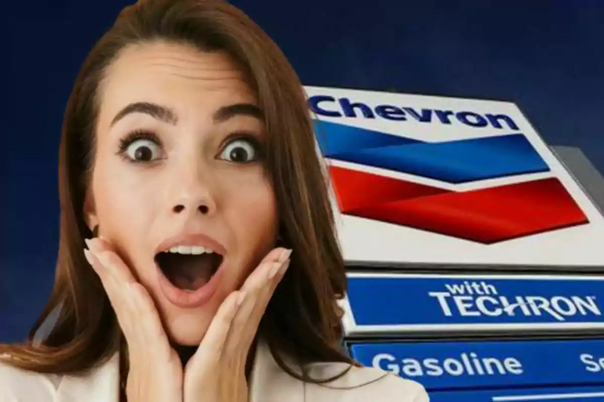 Woman with a surprised expression in front of a Chevron gas station sign