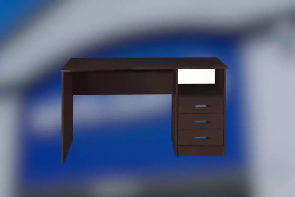Dark wood desk with three drawers and an open compartment against a blurred blue background Dark wood desk with three drawers and an open compartment against a blurred blue background