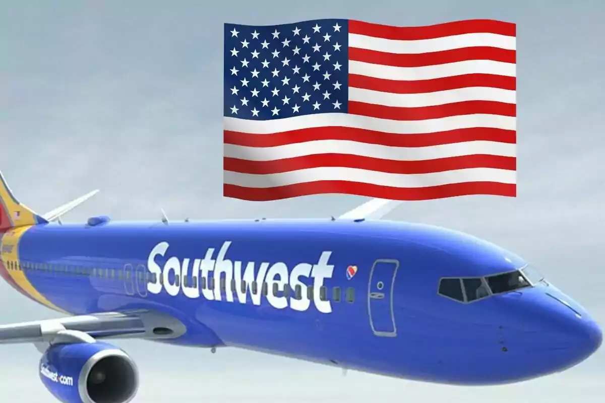 Southwest Airlines plane flying with a United States flag waving in the sky