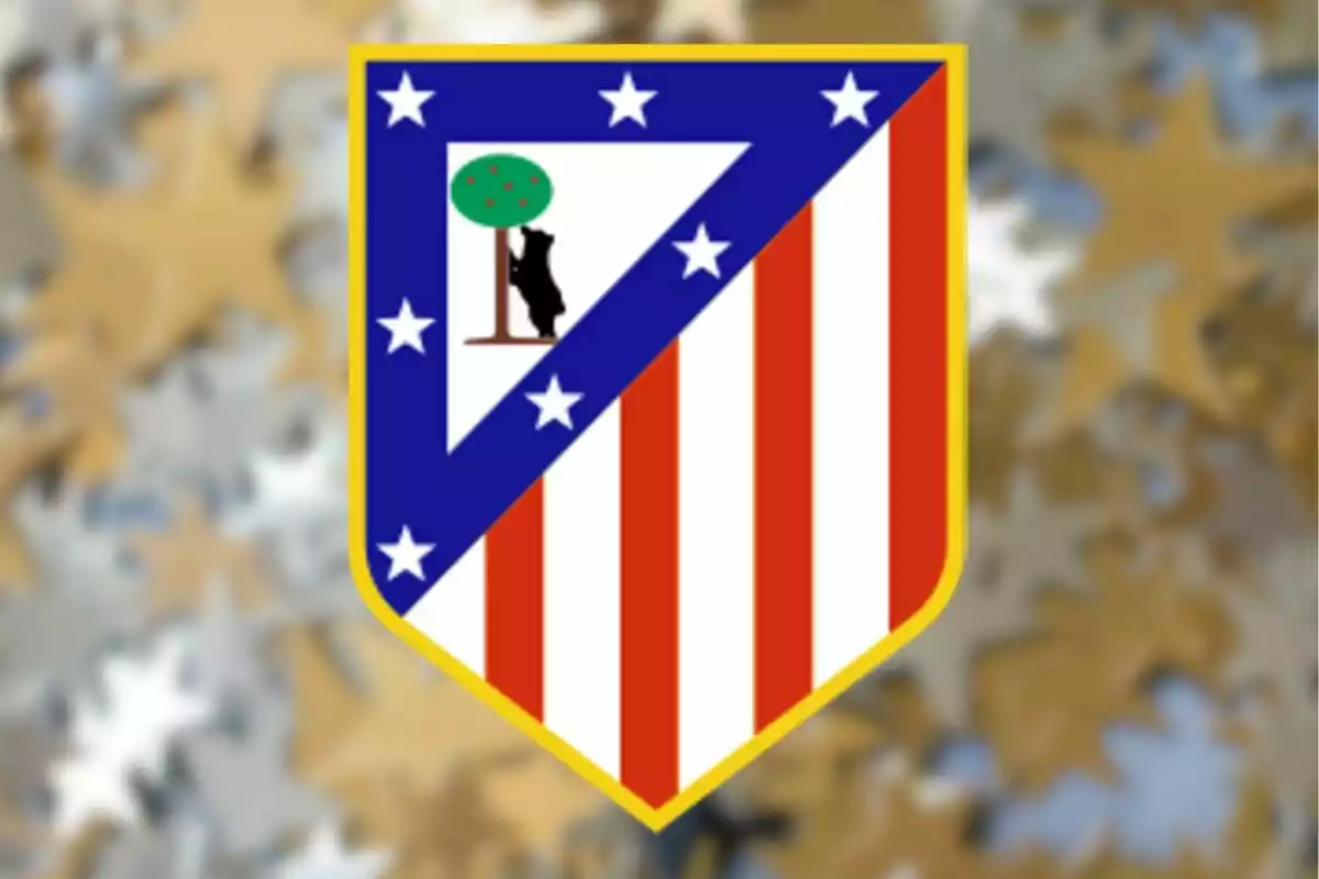 Escudo del Atlético de Madrid con fondo de estrellas desenfocadas