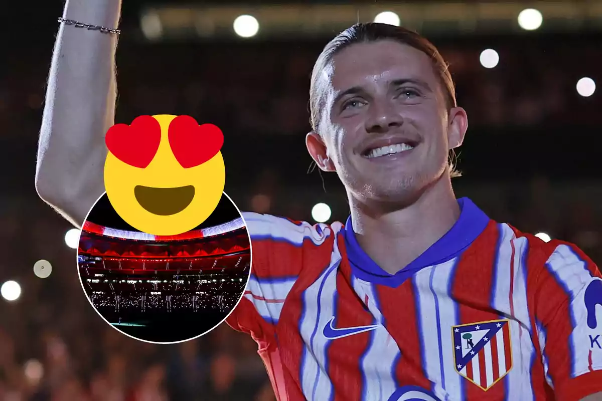 Un jugador de fútbol con la camiseta del Atlético de Madrid sonríe y levanta el brazo, con un emoji de cara con corazones y una imagen del estadio en el fondo.