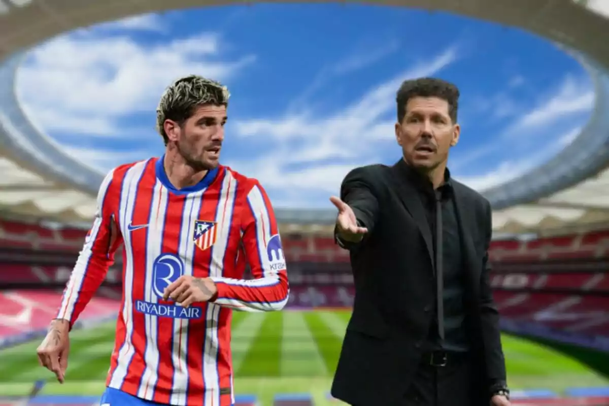 Un jugador de fútbol con uniforme del Atlético de Madrid y un hombre de traje en un estadio.