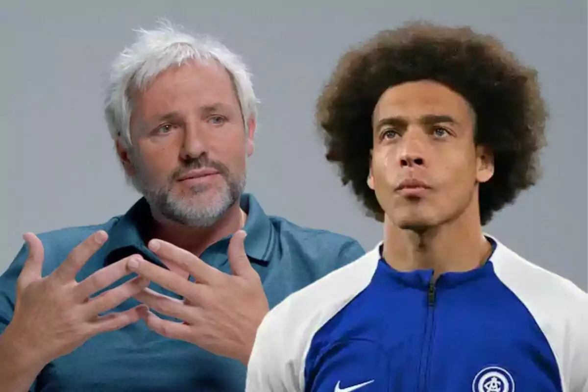 Dos hombres, uno con cabello canoso y barba, y otro con cabello rizado y uniforme deportivo azul, posan juntos frente a un fondo gris.