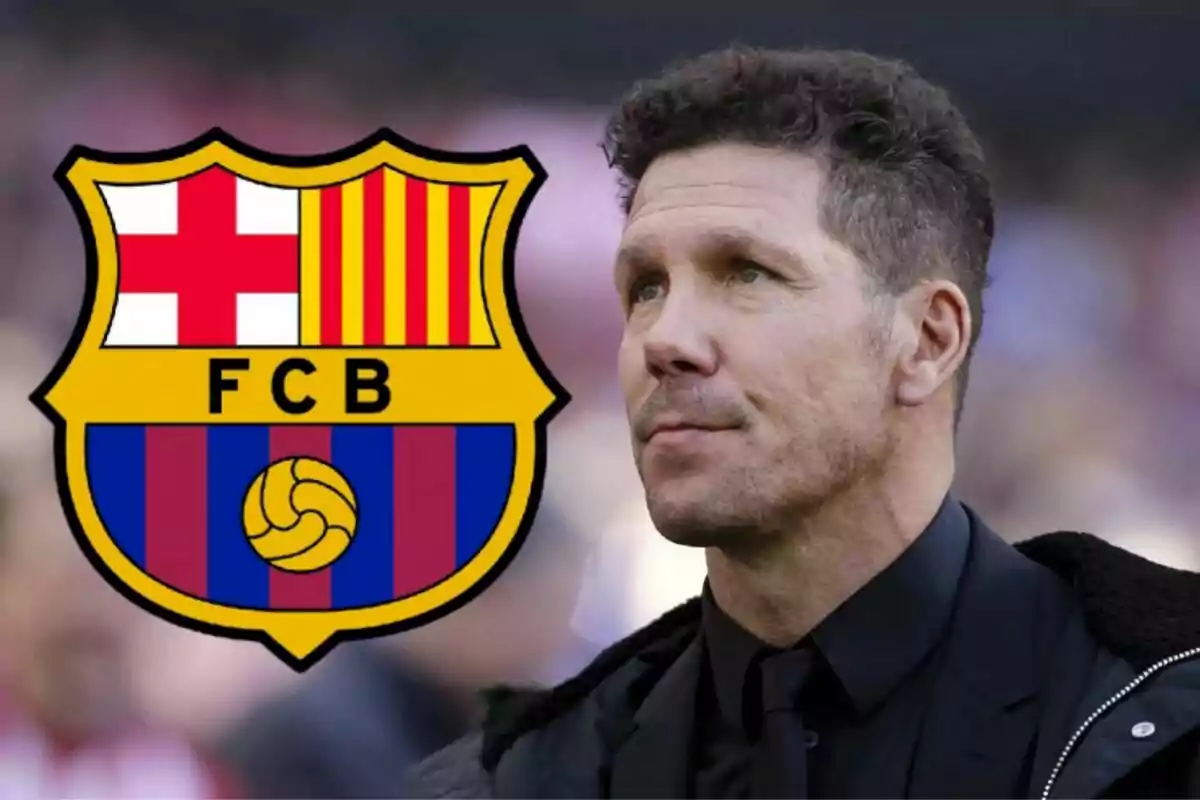 A man in a dark suit next to the FC Barcelona crest.