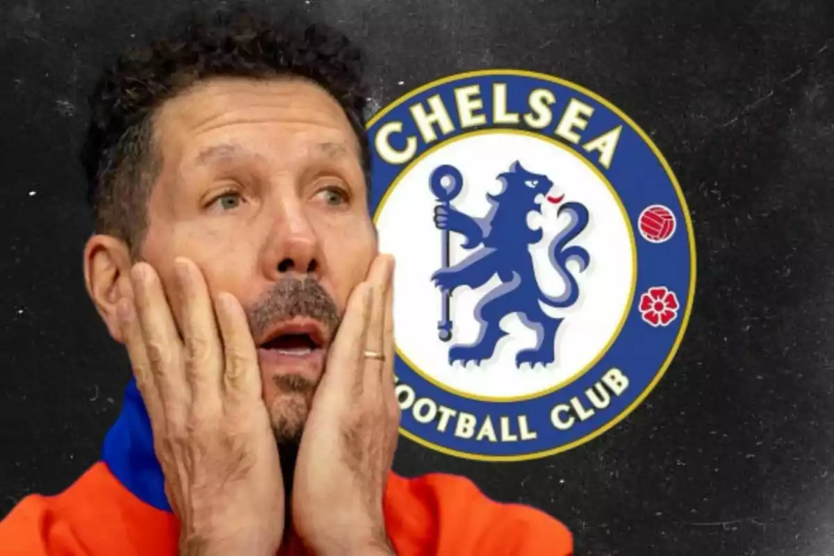 A man with a surprised expression in front of the Chelsea Football Club logo.