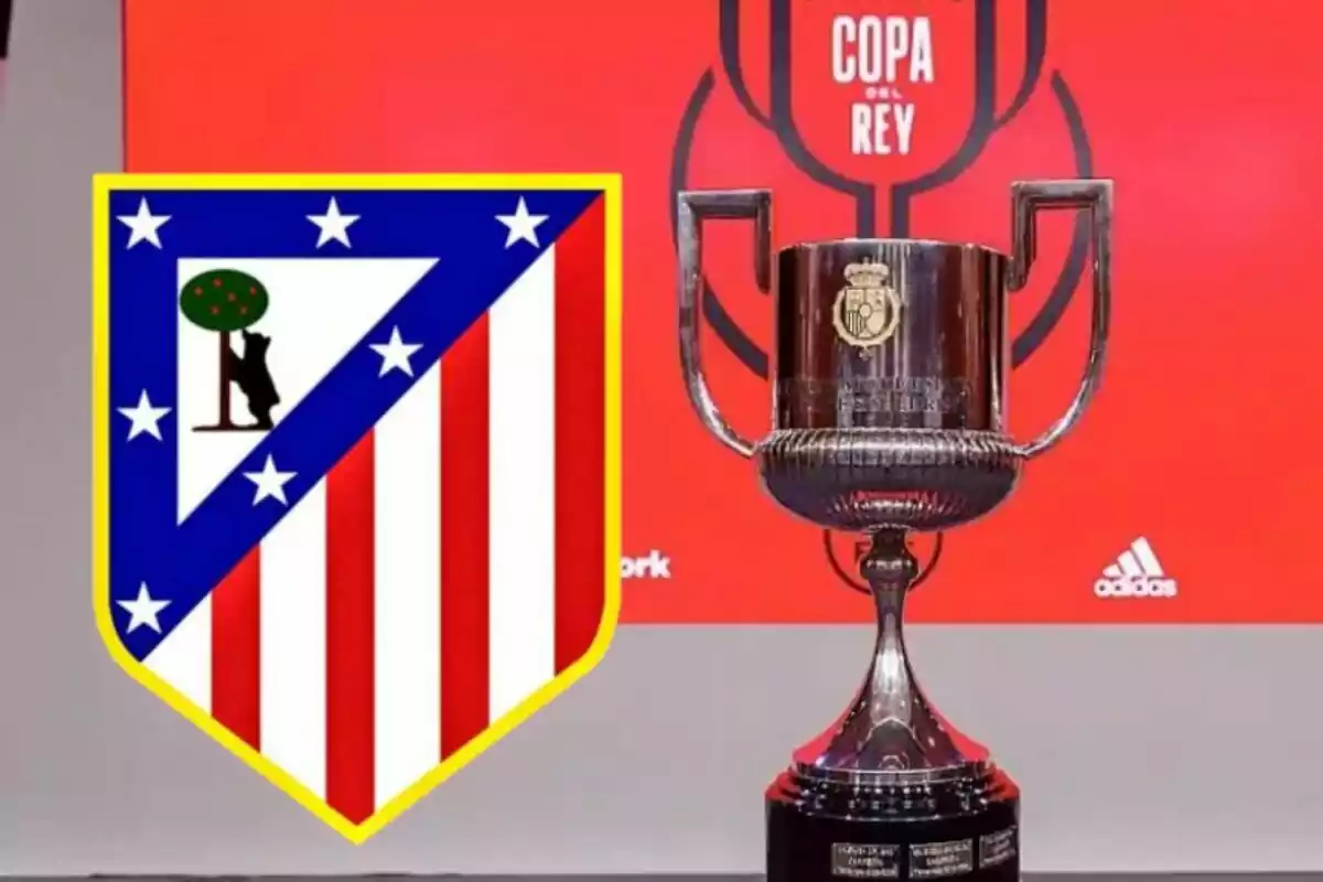 Escudo del Atlético de Madrid junto a un trofeo de la Copa del Rey sobre un fondo rojo.