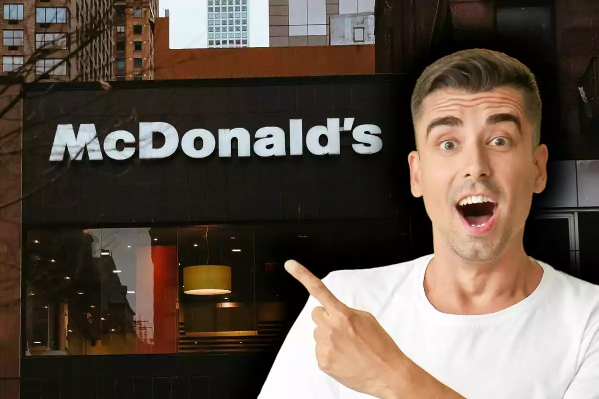 Un hombre sorprendido señala un letrero de McDonald's en un edificio urbano. Un hombre sorprendido señala un letrero de McDonald's en un edificio urbano.