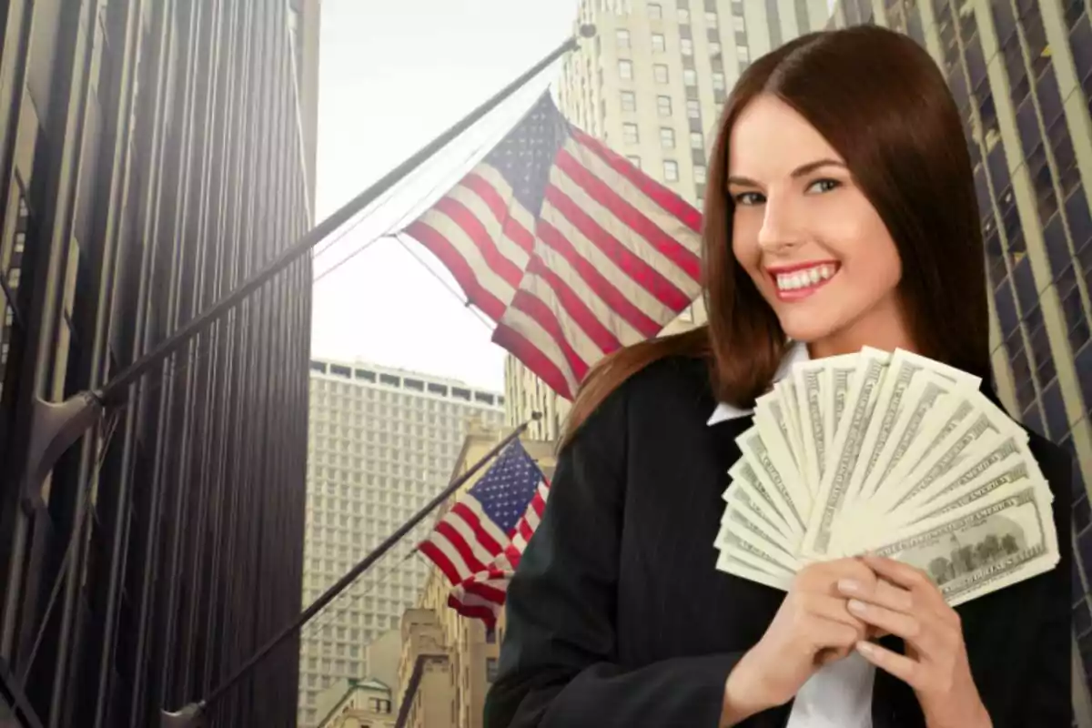 Smiling woman in a suit holding dollar bills on a street with American flags and tall buildings in the background Smiling woman in a suit holding dollar bills on a street with American flags and tall buildings in the background
