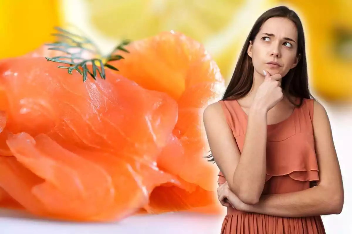 Woman thinking and a plate of smoked salmon Woman thinking and a plate of smoked salmon