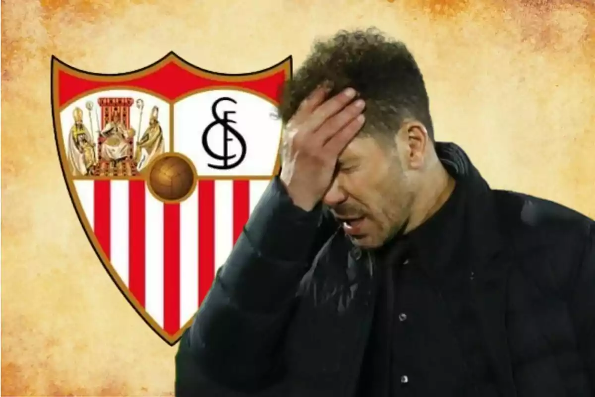 A man with a frustrated expression touches his forehead in front of a soccer team's emblem.