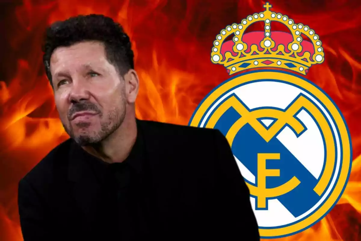 A man with a beard and dark hair in front of a background of flames and a soccer team crest.