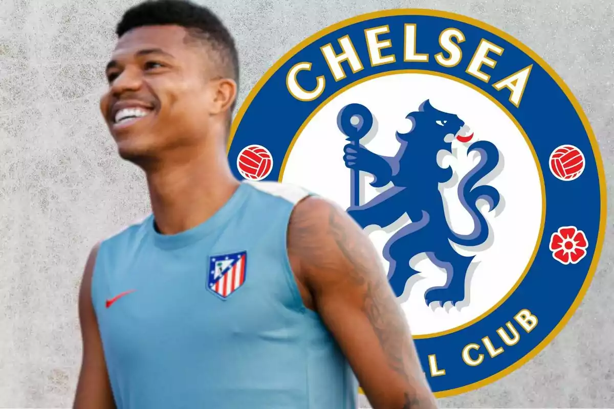 A smiling player with the Chelsea FC logo in the background.