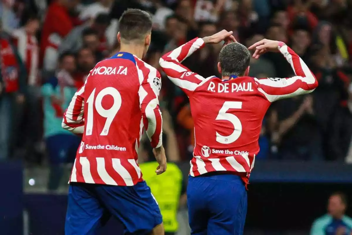 Rodrigo de Paul y Álvaro Morata celebrando un gol