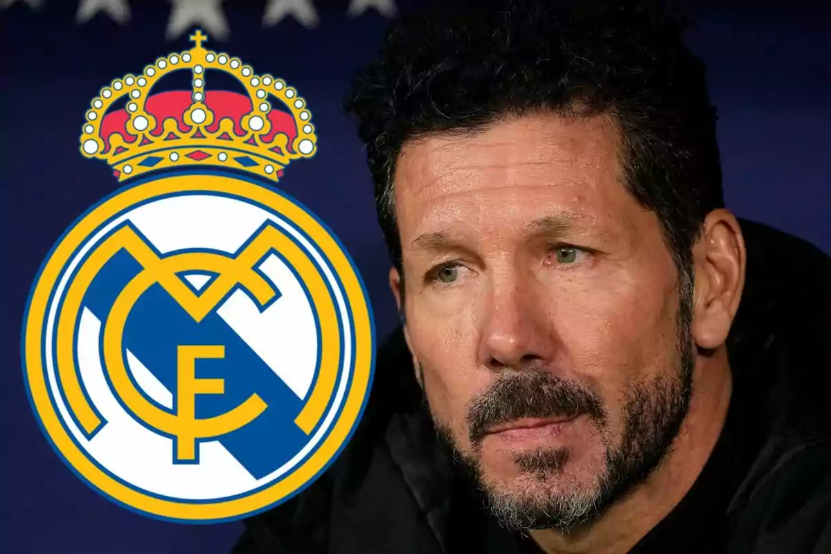 Un hombre con barba y cabello oscuro junto al escudo del Real Madrid.