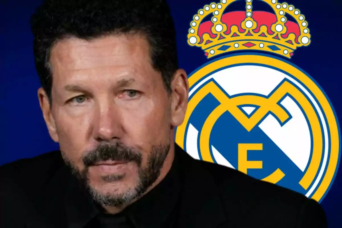 Un hombre con barba y cabello oscuro aparece frente a un escudo de un equipo de fútbol con una corona en la parte superior.