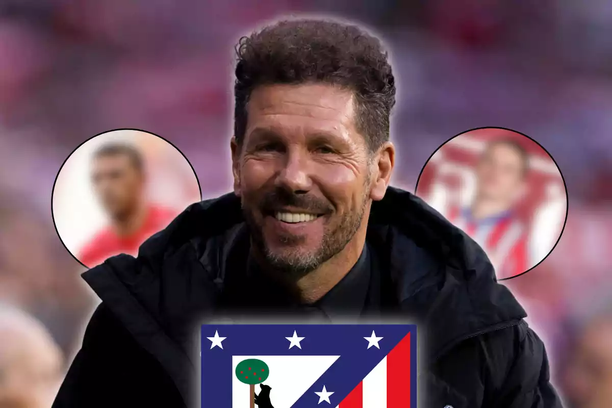 Un hombre sonriente con barba y cabello rizado, con el escudo del Atlético de Madrid en primer plano y dos figuras borrosas en el fondo.