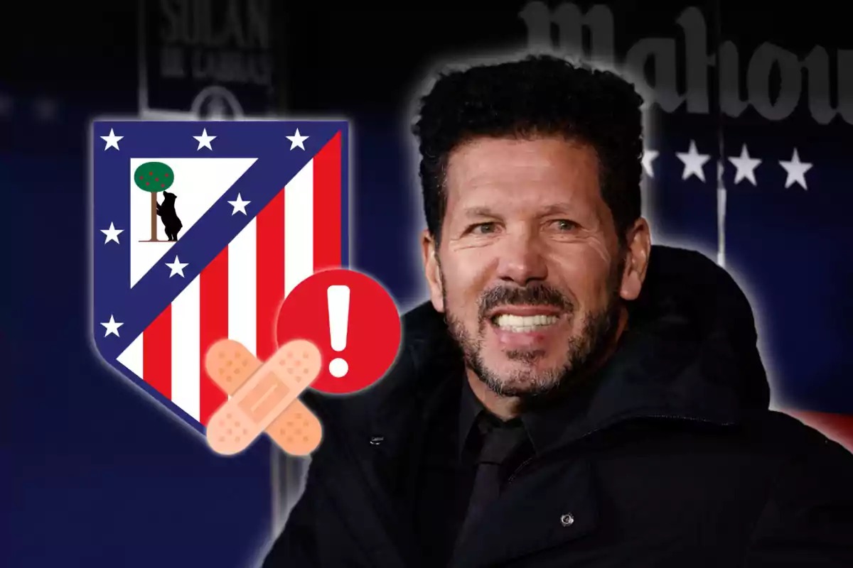 Un hombre sonriente con barba y cabello rizado, vestido con un abrigo oscuro, aparece junto al escudo del Atlético de Madrid, que tiene un icono de advertencia y una curita superpuestos.