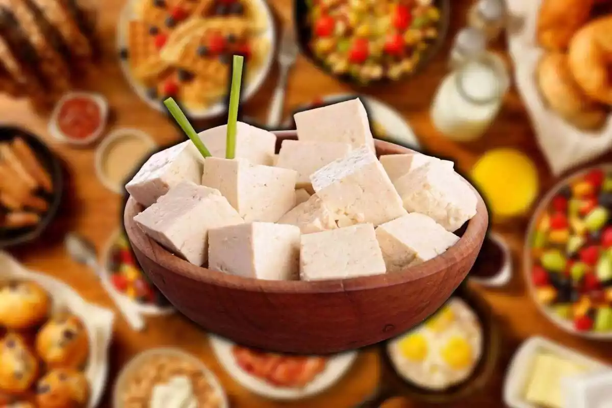 Tofu bowl with blurred background of a full breakfast Tofu bowl with blurred background of a full breakfast